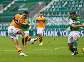 Tony Watt shooting for goal in Motherwell's 0-0 draw at Easter Road earlier this season. Picture: SNS