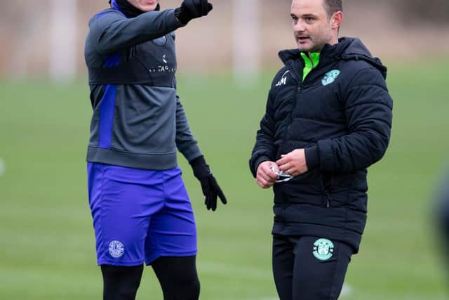 Shaun Maloney with Nisbet during a training session at HTC