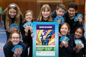 Pupils at Flora Stevenson Primary School have a first shot at playing the COP26 Top Trumps game which they helped to design