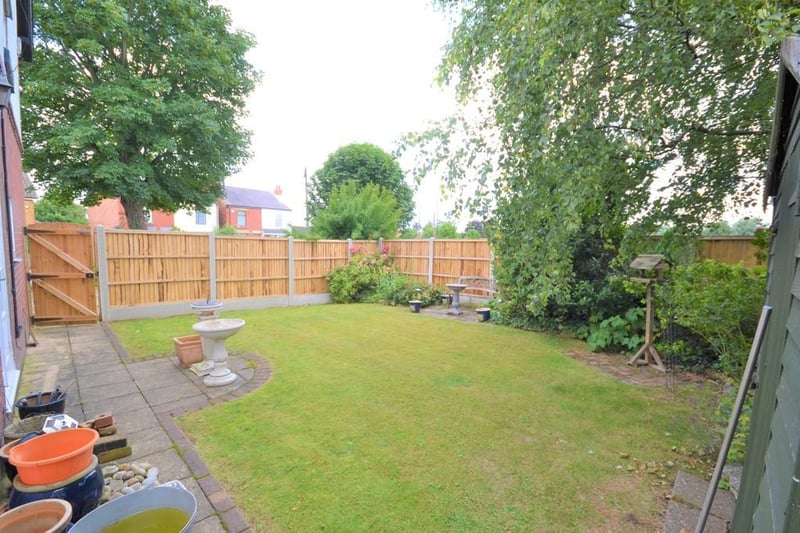 The rear garden provides a good degree of privacy from wooden fenced boundaries and mature hedging, this garden has been paved for ease of maintenance.
