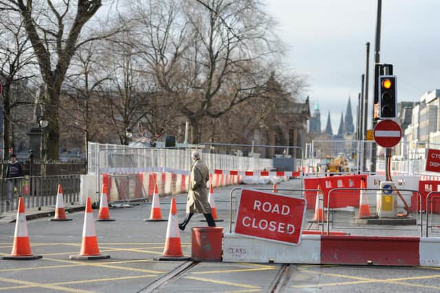 Trams works on  Princes Street -- the project was millions over budget, years late and made the city the butt of many jokes.   Picture: Neil Hanna