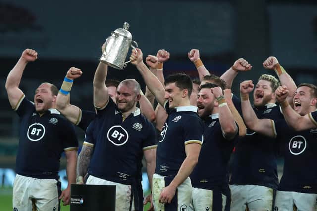 Debutants David Cherry, left, and Cameron Redpath lift the Calcutta Cup after Scotland's 11-6 win over England at Twickenham. Picture: David Rogers/Getty Images