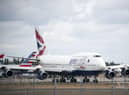 The number of passengers using IAG’s airlines remains significantly down on pre-pandemic levels, and fell again during the traditional peak festive season. Picture: Steve Parsons/PA Wire