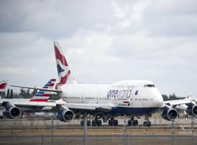 The number of passengers using IAG’s airlines remains significantly down on pre-pandemic levels, and fell again during the traditional peak festive season. Picture: Steve Parsons/PA Wire