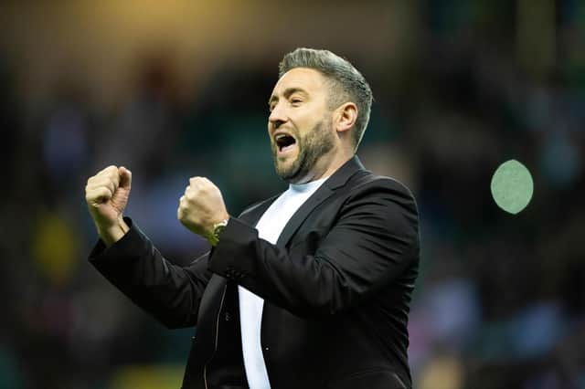 Hibs manager Lee Johnson celebrates at full-time