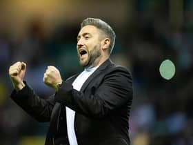 Hibs manager Lee Johnson celebrates at full-time