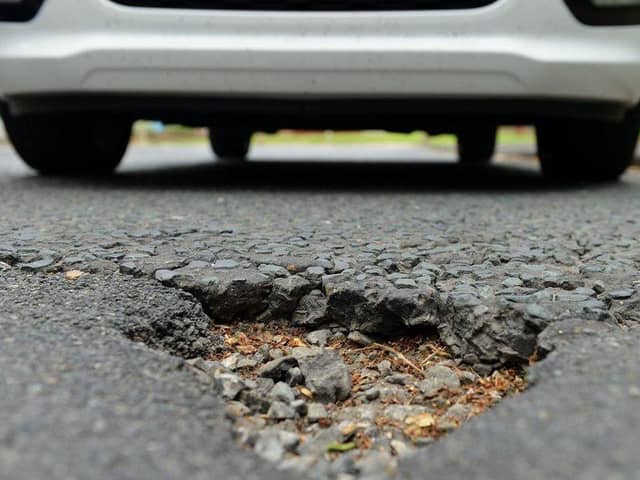 Potholes are a menace to cyclists as well as motorists