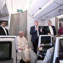 Archbishop of Canterbury Justin Welby (second from right), Pope Francis (second from left) and Church of Scotland's Iain Greenshields (third from right) address the media while aboard a plane returning from their visit to Democratic Republic of Congo and South Sudan (Picture: Tiziana Fabi/pool/AFP via Getty Images)