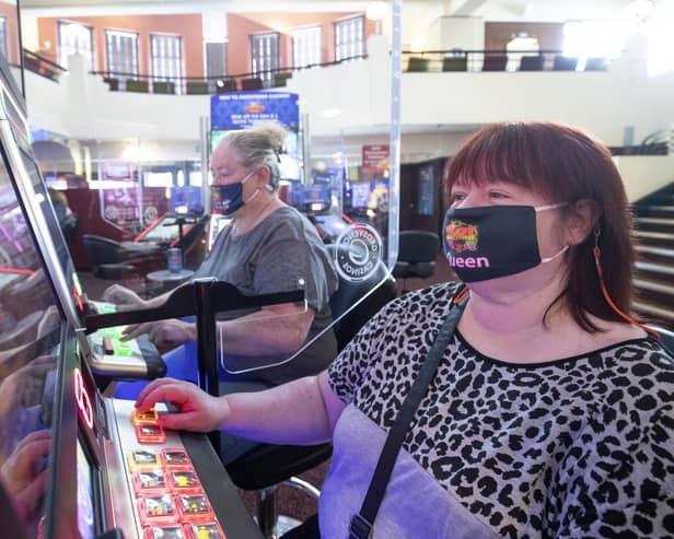 Customers Belinda Jamieson (right) and Elaine Banks play the slot machines at the Grosvenor Edinburgh Maybury Casino.
