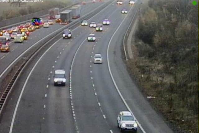 After a three-vehicle crash on the M9 near Edinburgh Airport, Road Traffic Scotland warned drivers of slow moving traffic.