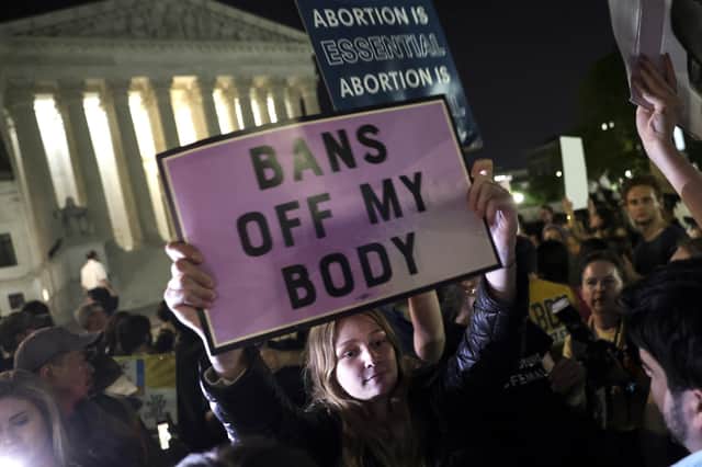 Demonstrators gather outside of the US Supreme Court to protest about the end of federal protection of abortion rights across the country (Picture: Kevin Dietsch/Getty Images)