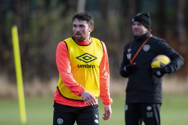 John Souttar, pictured in training today, has been offered a new contract by Hearts. His current deal expires in the summer