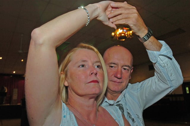 Kathryn Clark and her partner Chris Szpajer are seen dancing at the Crookes WMC