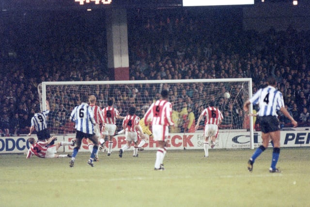 David Hirst scores for Wednesday at Bramall Lane in November 1992.
