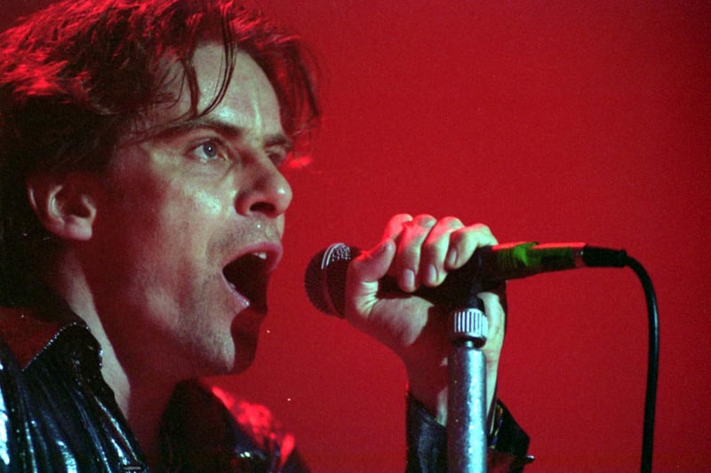 Deacon Blue lead singer Ricky Ross at the microphone on stage during a Deacon Blue concert at Ingliston in April 1993.