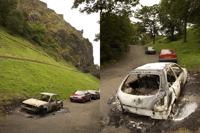 Burnt out cars on the road in Princes Street Gardens behind The Ross Bandstand, which were left there in August, 2004.