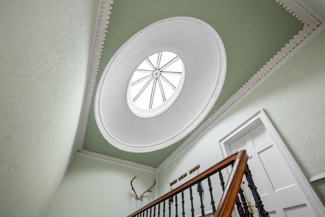 The property is bathed in natural light, not just with large Georgian windows, but also a circular skylight.