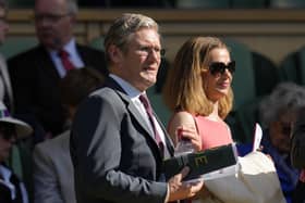 Labour leader Sir Keir Starmer and his wife Victoria stand in the Royal Box on Center Cour
Pic: AP Photo/Kirsty Wigglesworth
