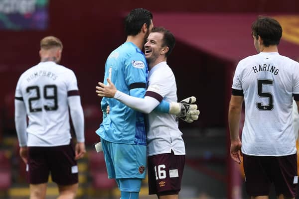 Craig Gordon and Andy Halliday embrace at full time. Picture:n Ross MacDonald / SNS