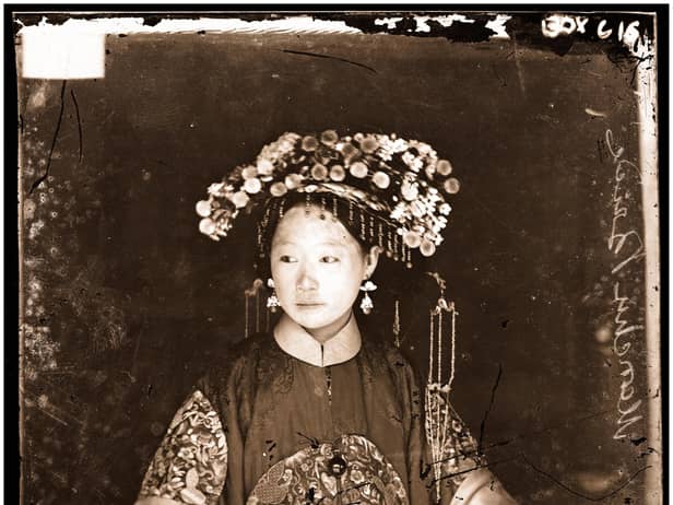 Thomson took many photographs of Manchu brides and their magnificent wedding costumes. He was sympathetic to the lives of these young teenage brides, which he reckoned to be a life of slavery, in which the wife ‘is even liable to be beaten by her mother-in-law, and husband too, if she neglects to discharge her duties as 'general domestic drudge’.