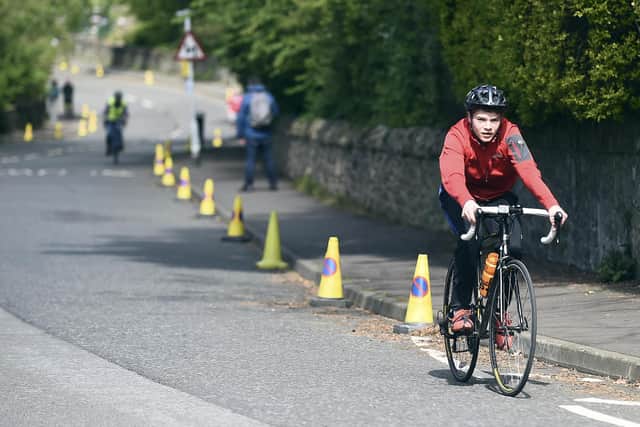 Cyclists and pedestrians on traffic-free Braid Road