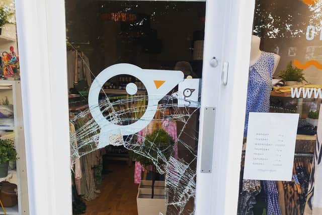 The glass door of Rosy Penguin on Morningside Road smashed by thieves in the early hours of Saturday morning (Photo: Rosy Penguin).
