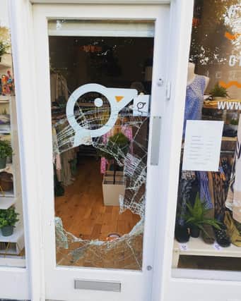 The glass door of Rosy Penguin on Morningside Road smashed by thieves in the early hours of Saturday morning (Photo: Rosy Penguin).