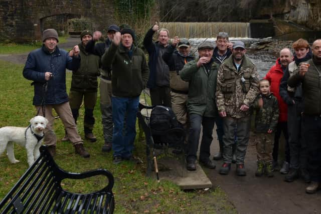 Anglers toast the river at the official opening. Picture by Nigel Duncan