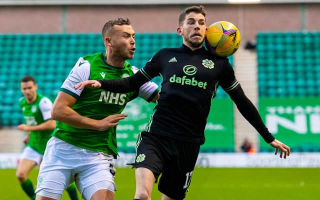 Ryan Porteous and Ryan Christie battle for the ball