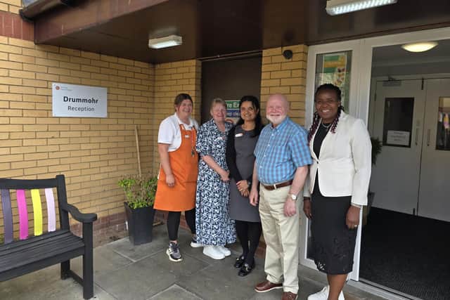 Colin Beattie, Member of Scottish Parliament (MSP) for Midlothian North and Musselburgh at HC-One Scotland’s Drummohr Care Home with Priscillah Musenga, Home Manager at HC-One Scotland’s Drummohr Care Home and colleagues