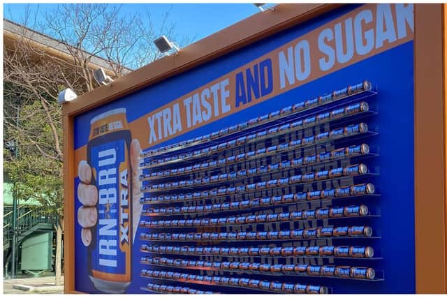 A ‘drinkable’ Irn-Bru billboard is popping up in cities across Scotland, including Edinburgh, giving passers-by the opportunity to snag a free can.