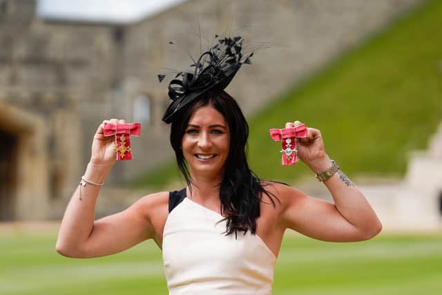 Olympic curler Eve Muirhead holds her OBE (left) and MBE, following an investiture ceremony at Windsor Castle
Pic: Andrew Matthews