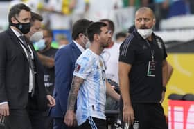 Brazil vs Argentina abandoned: Argentina's Lionel Messi walks off the field after the qualifying soccer match for the FIFA World Cup Qatar 2022 against Brazil was interrupted by health officials in Sao Paulo, Brazil on Sunday 5 September. (Image credit: AP Photo/Andre Penner)