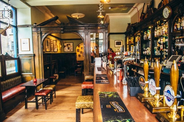 CAMRA says: It has an old gantry, bar counter, vestibule entrance and a fireplace covered by seating. It is divided into two rooms by a pedimented arch, which had the wood panel on the counter replaced by a glass one in recent years.