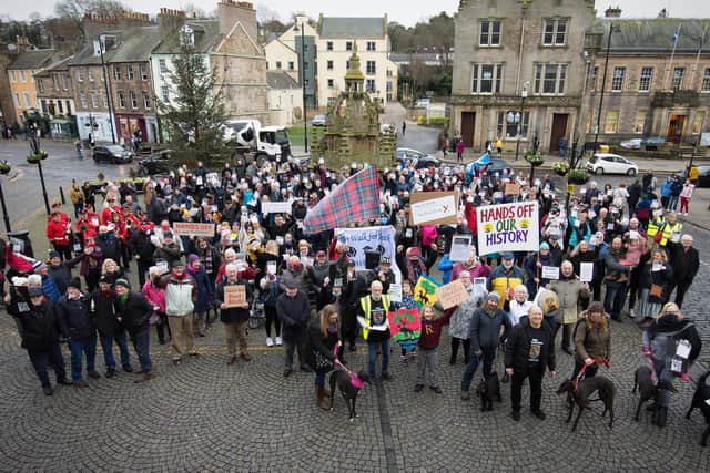 Protestors gathered in Linlithgow town centre on Saturday to oppose Greene King's plans to change the name of the Black Bitch pub in the town. Photo by Angus Laing.