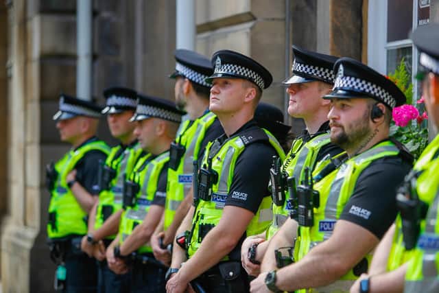 Police on Edinburgh's Royal Mile following the death of Queen Elizabeth II