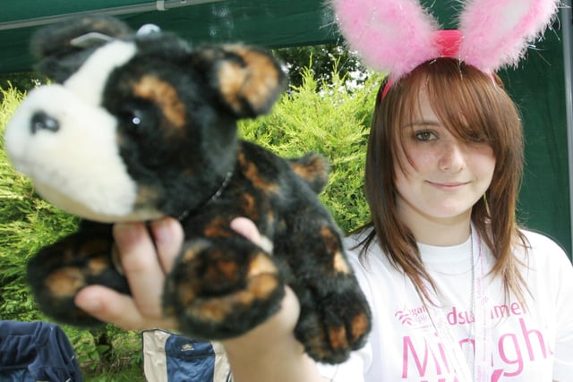 Emma Thorpe with a toy at Ashgate Hospice summer fayre in 2009