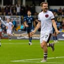 Winger Alan Forrest celebrates scoring Hearts' winner at Ross County. Pic: SNS