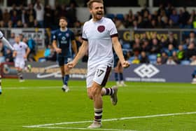 Winger Alan Forrest celebrates scoring Hearts' winner at Ross County. Pic: SNS