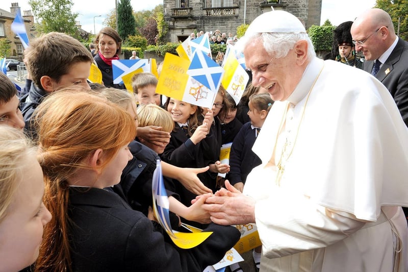 Pope Benedict made a point of greeting children when he went among the crowds.  Arriving at the Archbishop's house in Morningside for lunch, he surprised everyone by going back out to the street for a walkabout.  Pupils from St Peter's RC Primary were there to sing and cheer but got an unexpected close encounter with pontiff when he came over, blessed two of the pupils, shook hands with about ten others and even kissed a neighbour's baby.