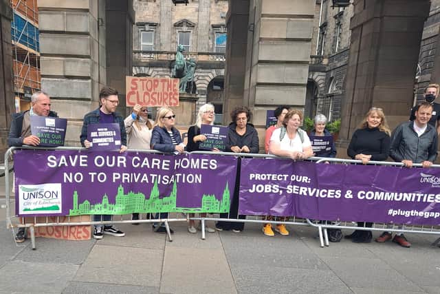Protesters demonstrated outside the City Chambers