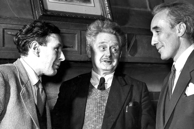 Poets Norman MacCaig, Hugh MacDiarmid and Sydney Goodsir Smith chat at a Burns Supper in Newhaven in 1959.