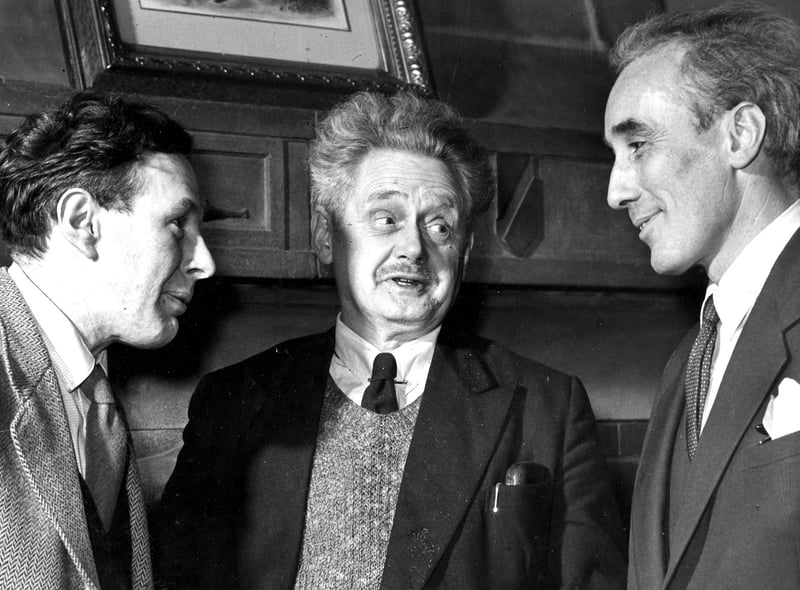 Poets Norman MacCaig, Hugh MacDiarmid and Sydney Goodsir Smith chat at a Burns Supper in Newhaven in 1959.