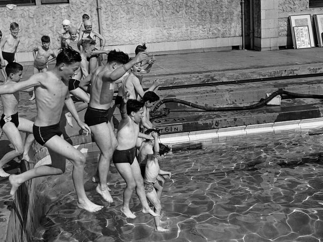 Jumping in at the deep end at Portobello Outdoor Swimming Pool in 1952.