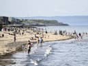 Edinburgh locals share concerns after potential pollution spotted in waters near Portobello Beach, a popular swimming spot.