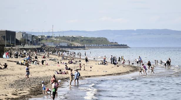 Edinburgh locals share concerns after potential pollution spotted in waters near Portobello Beach, a popular swimming spot.