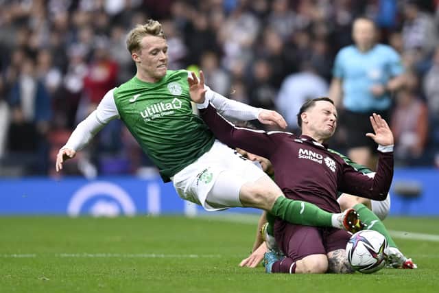 Barrie McKay receives some rough treatment during Hearts' 2-1 semi-final victory over rivals Hibs. Picture: SNS