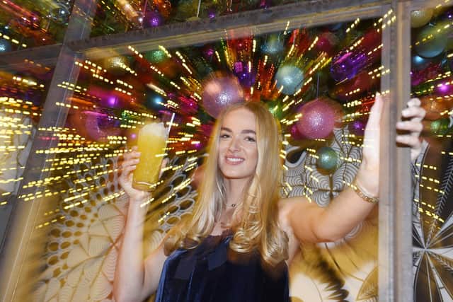 Experience an extraordinary Christmas this year with Tigerlily.  Pictured is Miss Scotland Lucy Thomson enjoying Herradura cocktails. Photo: Greg Macvean