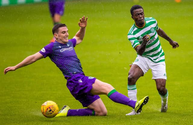 Paul Hanlon challenges Celtic midfielder Ismaila Soro during a pre-season clash