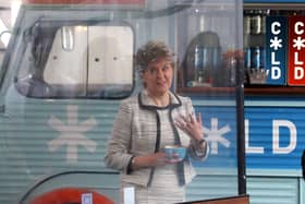 First Minister Nicola Sturgeon beside a screen which was been erected around tables during a visit to Cold Town House in Edinburgh's Grassmarket in July 2020.